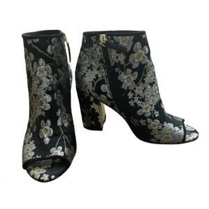 Nine West open toe heeled bootie.